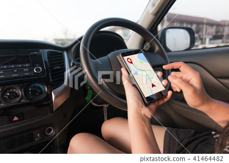 Hand of woman using smartphone with gps  41464482