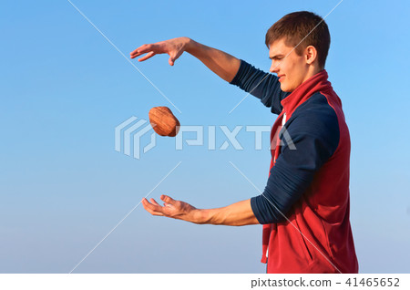 a young man with a stone, levitation 41465652