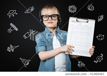 Clever boy feeling confident while making an energy research 41466461