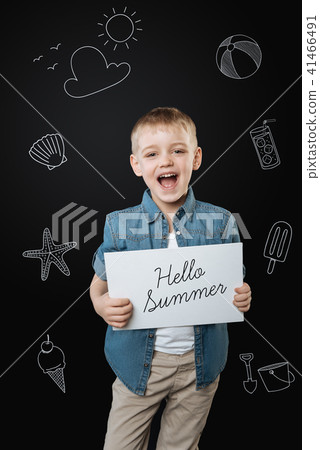 Little boy opening his mouth and smiling while loving summer Little boy opening his mouth and smiling while loving summer 41466491