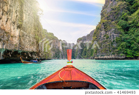 Traveling with long tail boat on lagoon sea 41469493
