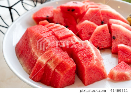 Red fruit watermelon slices on plate in morning 41469511