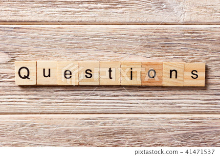 Questions word written on wood block. 41471537