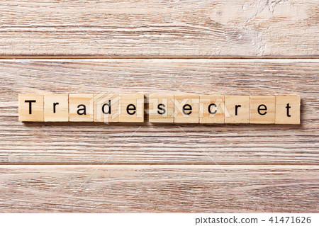 trane secret word written on wood block. trane secret word written on wood block. 41471626
