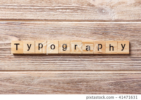 typography word written on wood block. typography word written on wood block. 41471631