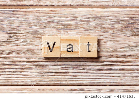 Vat word written on wood block. Vat word written on wood block. 41471633
