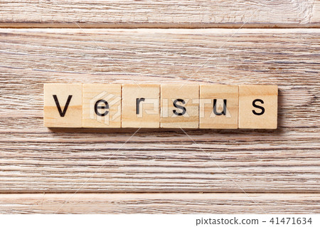 Versus word written on wood block Versus word written on wood block 41471634