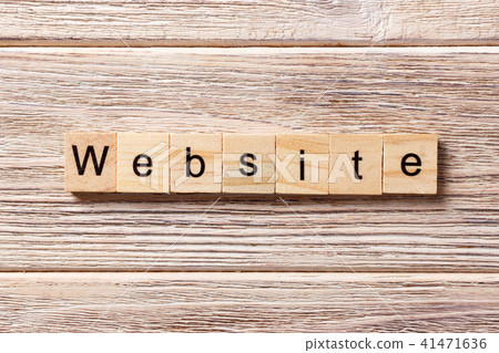 Website word written on wood block. Website word written on wood block. 41471636