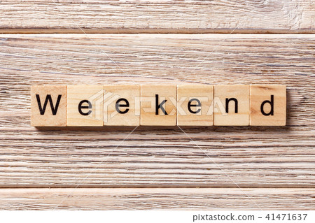 weekend word written on wood block. weekend word written on wood block. 41471637