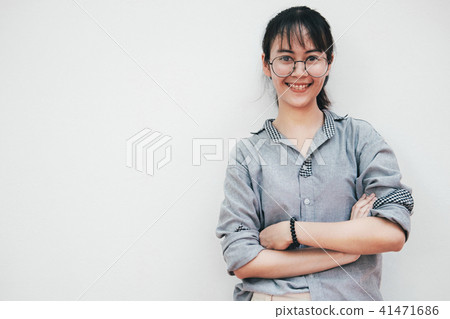 Happy teenage girl with smiling looking at camera. Happy teenage girl with smiling looking at camera. 41471686