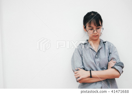 Portrait of thinking and angry and loanly young woman Portrait of thinking and angry and loanly young woman 41471688