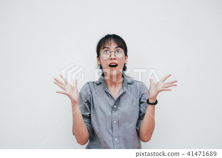 Portrait of surprised happy asian girl. Portrait of surprised happy asian girl. 41471689