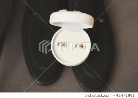 Two golden wedding rings isolated background concept Two golden wedding rings isolated background concept 41471991
