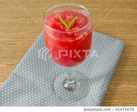 Ripe and Sweet Watermelon Juice with Mint Leaves Ripe and Sweet Watermelon Juice with Mint Leaves 41473079