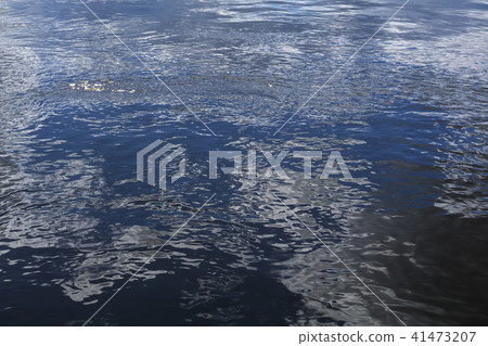 wavy water surface with reflection of sky wavy water surface with reflection of sky 41473207