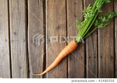Fresh Hokkaido carrots with leaves Fresh Hokkaido carrots with leaves 41480358