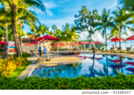 Abstract blur and defocused beautiful outdoor swimming pool in hotel and resort 41486037