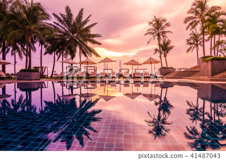 Beautiful luxury outdoor swimming pool in hotel and resort Beautiful luxury outdoor swimming pool in hotel and resort 41487043