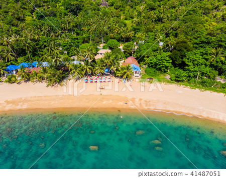 Aerial view of beautiful tropical beach and sea with palm and other tree in koh samui island Aerial view of beautiful tropical beach and sea with palm and other tree in koh samui island 41487051