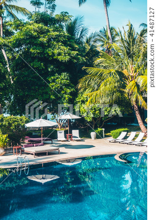 Beautiful luxury outdoor swimming pool 41487127