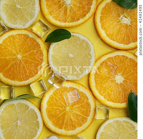 Close Up of Lemon Orange Leaves Cube Ice Sea Shell Close Up of Lemon Orange Leaves Cube Ice Sea Shell 41491495