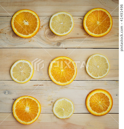 Lemon Orange Citrus Pattern on Wooden Texture Lemon Orange Citrus Pattern on Wooden Texture 41491496