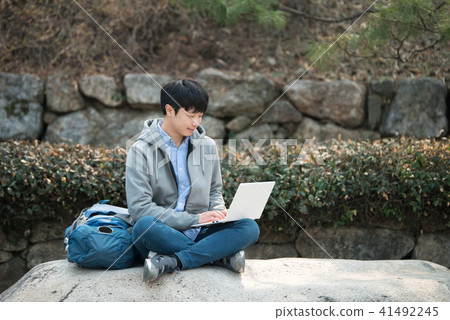 Young man, Korean, Travel, Laptop, Namsangol Hanok Village Young man, Korean, Travel, Laptop, Namsangol Hanok Village 41492245