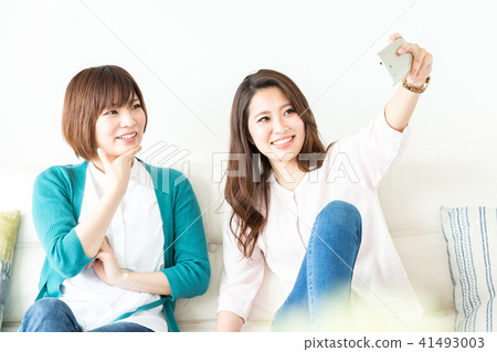 Woman taking a selfie Woman taking a selfie 41493003