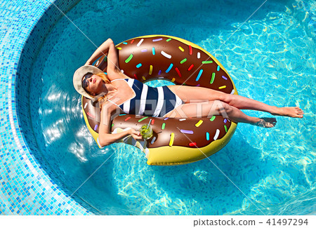 Young woman on summer pool party Young woman on summer pool party 41497294