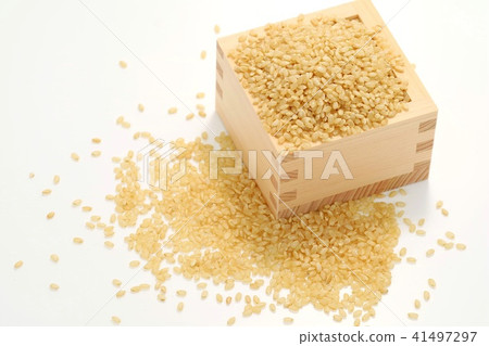 Brown rice white background Brown rice white background 41497297