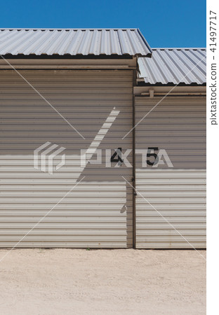Industrial warehouse building with numbers on the wall. Abstract architecture background Industrial warehouse building with numbers on the wall. Abstract architecture background 41497717