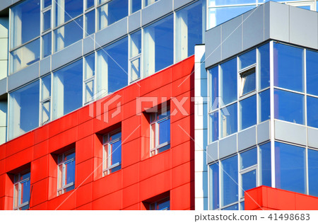 Part of the facade modern building with red and blue 41498683