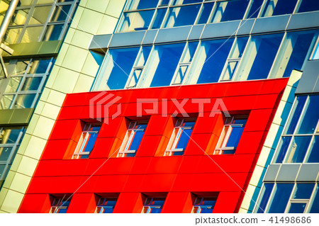 Part of the facade modern building with red and blue 41498686