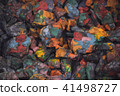 abstract background of the plane lying on colored stones 41498727