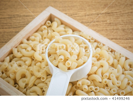 Elbow Macaroni or Gomiti Pasta in Measuring Cup Elbow Macaroni or Gomiti Pasta in Measuring Cup 41499246