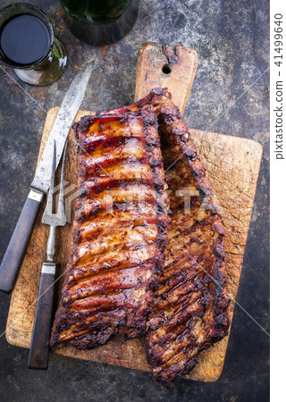 Barbecue pork spare ribs with fruit relish as top  41499640