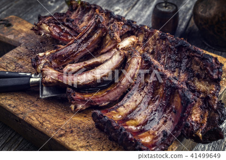 Barbecue pork spare ribs with fruit relish as top  41499649