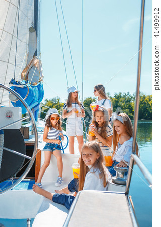 The children on board of sea yacht 41499912