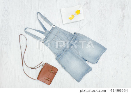 Blue denim romper, handbag and sunglasses Blue denim romper, handbag and sunglasses 41499964