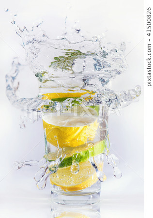 Lemons and limes in the glass 41500826