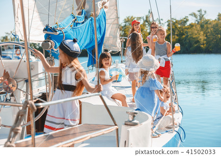 The children on board of sea yacht The children on board of sea yacht 41502033