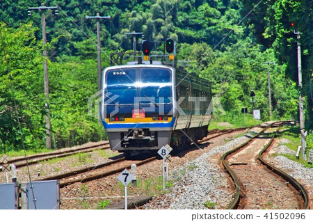 Railroad and train at the unexplored border station in the mountains Railroad and train at the unexplored border station in the mountains 41502096