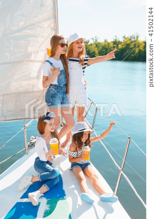 The children on board of sea yacht 41502144