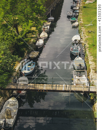 yachts stand at sea in the canal at summer day 41503193