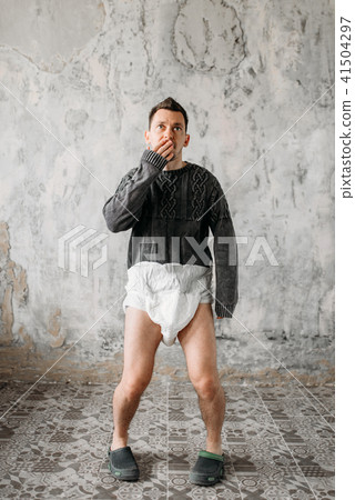 Freak man in diaper wrapped in packaging film 41504297