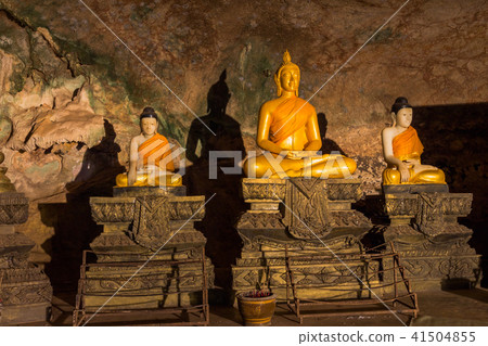 golden buddha statues in the cave. golden buddha statues in the cave. 41504855