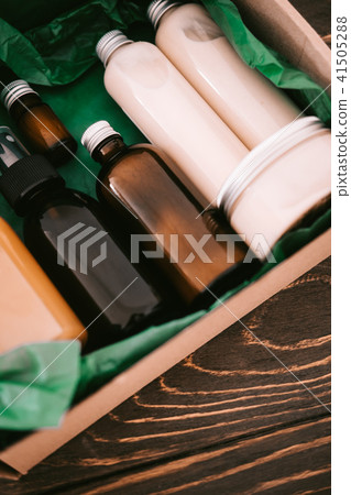 Beauty box with bottles of natural cosmetics Beauty box with bottles of natural cosmetics 41505288