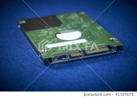 Close up of hard disk internal mechanism hardware 41505678