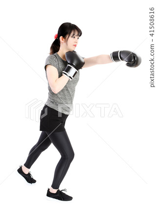 A woman sweating in a boxer's size 41508616