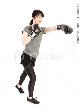 A woman sweating in a boxer's size A woman sweating in a boxer's size 41508617